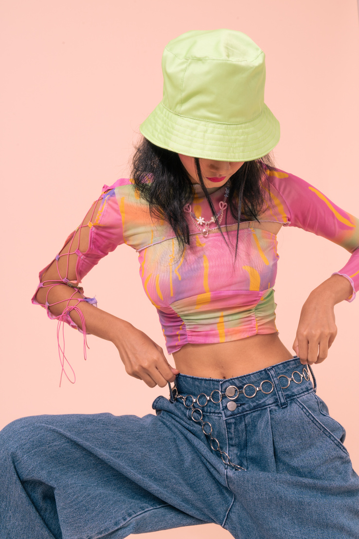 Portrait of a Young Woman in 90s Fashion