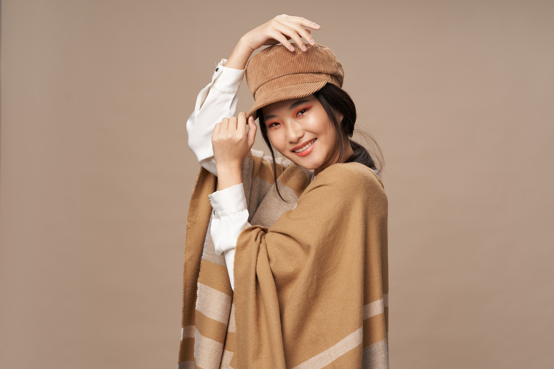 Cheerful Asian Woman Fashionable Clothing Lifestyle Beige Background